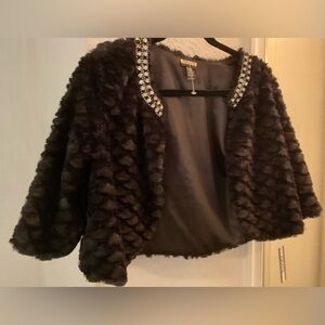 Black jacket/shawl with jeweled accidents.  Size small.  New with tags.